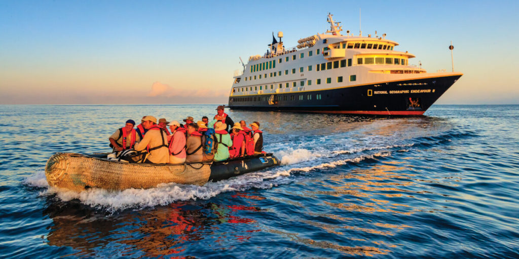 A pasenger-filled zodiac leaving National Geographic Endeavour II