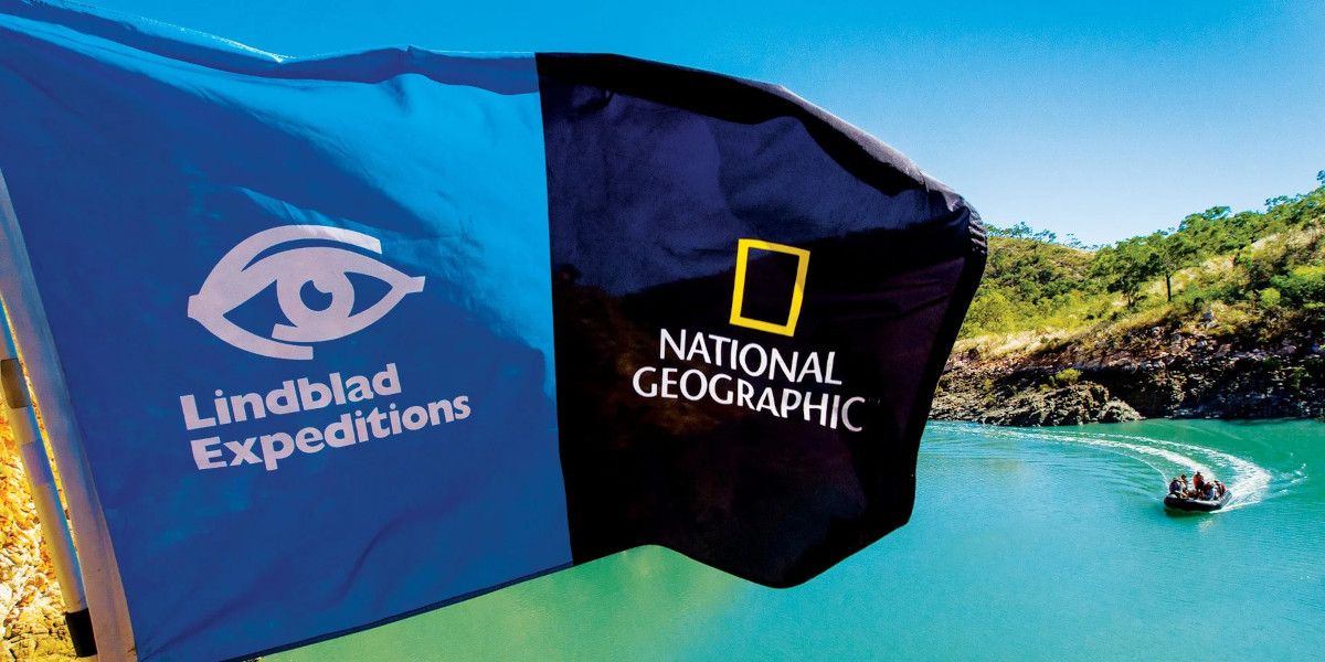 A flag with the Lindblad Expeditions and National Geographic logos